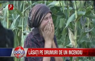 Lăsaţi pe drumuri de un incendiu