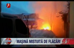 Masina mistuita de flacari