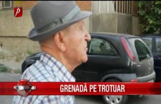 Grenadă pe trotuar