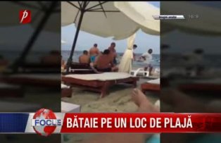 Bătaie pe un loc de plajă