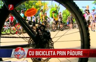 Cu bicicleta prin padure