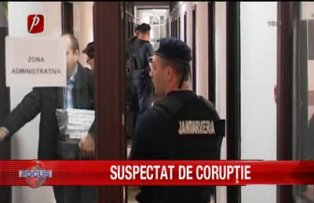 Suspectat de corupţie