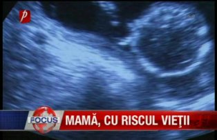 Mamă, cu riscul vieţii