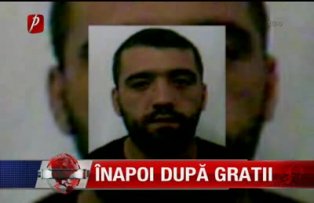 Înapoi după gratii