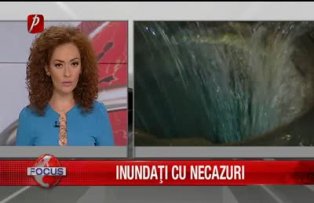 Inundati cu necazuri