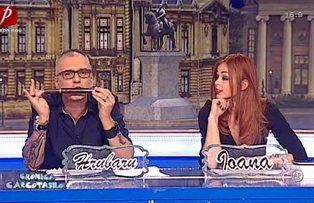 VIDEO / Cristian Hrubaru a cantat la "digifonf" in direct, la "Cronica Carcotasilor"