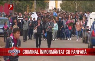 Criminal înmormântat cu fanfară