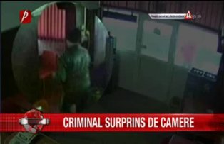 Criminal surprins de camere