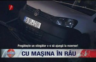 Cu masina in rau