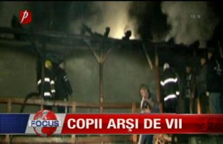 Copii arsi de vii