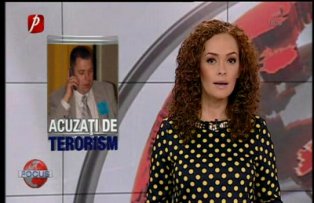 Români acuzaţi de terorism