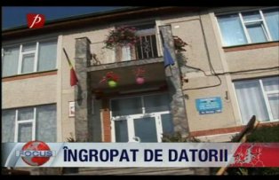 Ingropat de datorii