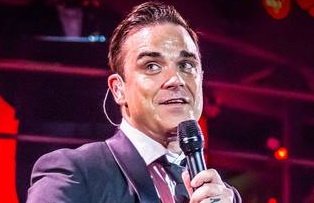 Anunţ şoc: Robbie Williams vine în România?