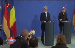 Ciolos si Merkel la aceeasi masa