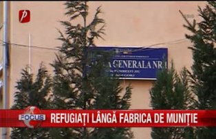 Refugiati langa fabrica de munitie