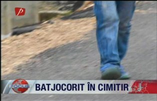 Batjocorit in cimitir