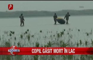 Copil gasit mort in lac