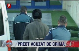 Preot acuzat de crima