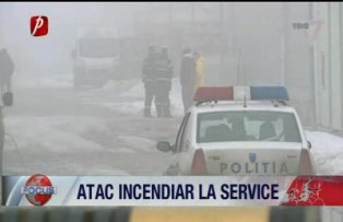 Atac incendiar la service